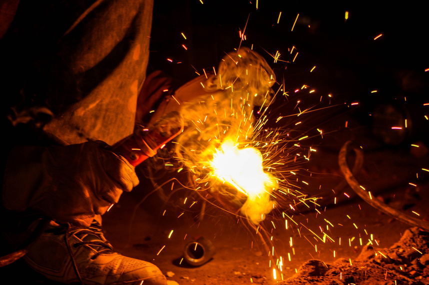 Specialised welding sparks in industrial workshop